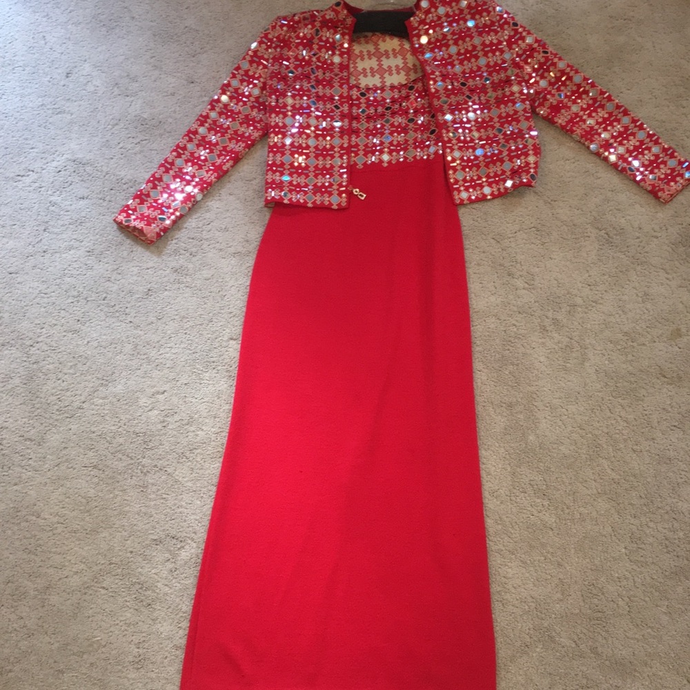 St Johns ruby red dress paired with a bling jacket